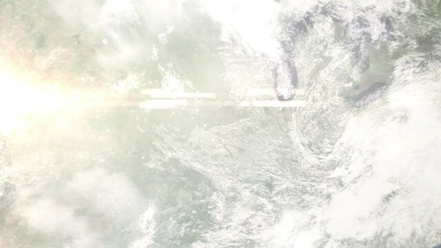 Earth zoom in from outer space to city. Zooming on Fort Madison, Iowa, USA. The animation continues by zoom out through clouds and atmosphere into space. Images from NASA