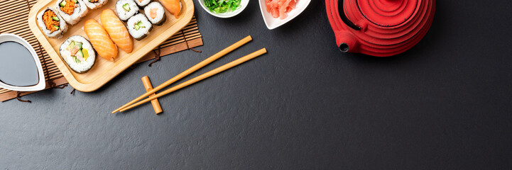 Japanese sushi set with teapot. Top view