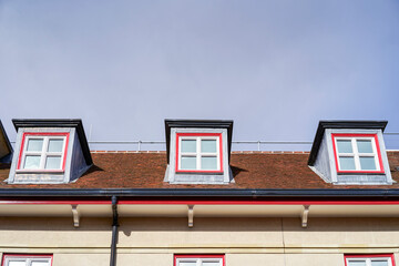 house in the city with dormer windows