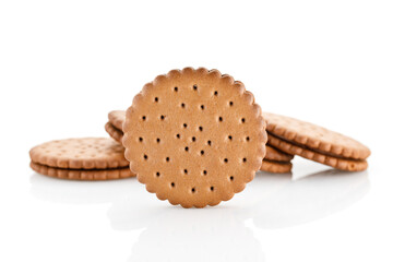 Double chocolate chip cookie. Tasty chocolate sandwich cookies with choco cream, isolated on white background. Close-up