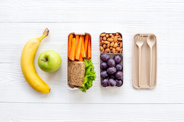 Luch box with sandwiches and bamboo cutlery