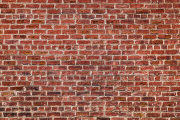 Fototapeta na wymiar the old red brick wall
