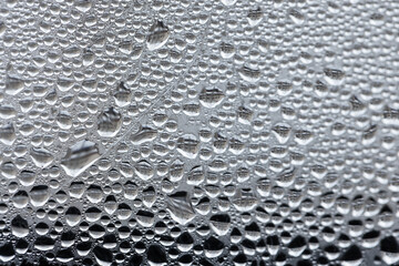 Water drops are on glass, background photo texture