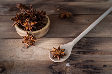 Star anise cooking spice drying on a bamboo mat