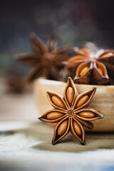 Star anise cooking spice drying on a bamboo mat