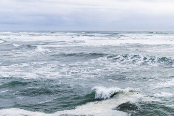 Waves in Pacific Ocean on Cloudy Day in Winter at Columbia River South Jetty