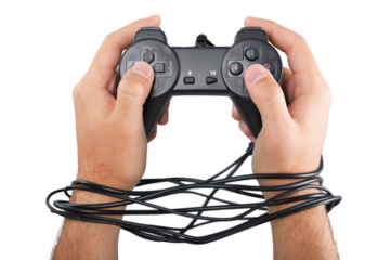 Male wired hands with joypad meaning videogame addiction