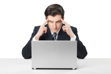 Business man working on laptop and thinking