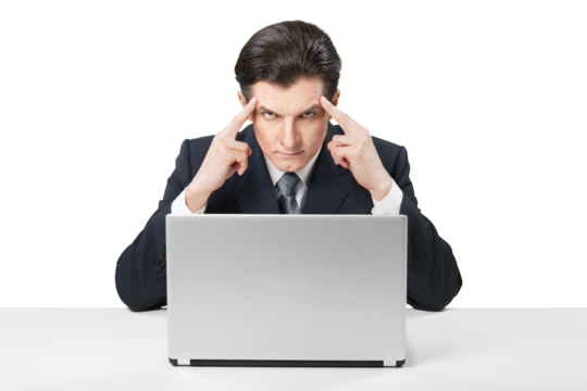 Business man working on laptop and thinking