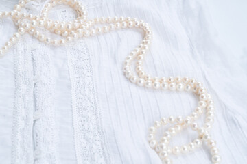 Pearl jewellery styled stock scene, for wedding invitation, product showcase or styled presentation with copy space