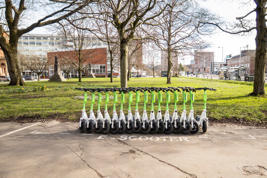 Salford, Manchester, Uk, March 11, 2023 E-scooters Parked Together At Salford Museum And Art Gallery, City Green Transportation