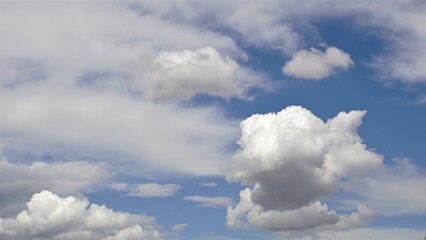 sky background with cumulus and nimbus clouds