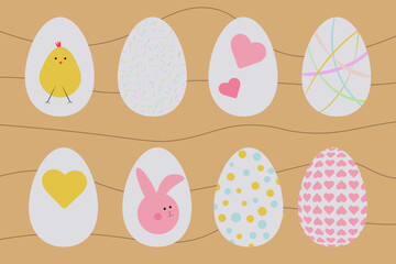 Collection of cute decorative easter eggs with chicken, bunny and other elements.