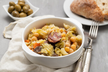 Traditional chickpeas dish in casserole in brown dish