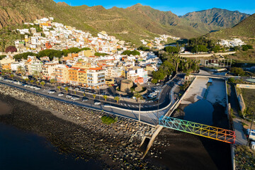Aerial view above rainbow colored swimming beach - Playa de Las Teresitas - in San Andres Tenerife Canary Islands