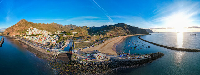 Obraz premium Aerial view above rainbow colored swimming beach - Playa de Las Teresitas - in San Andres Tenerife Canary Islands