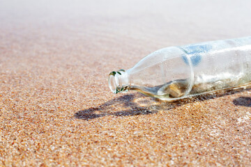 Glass bottle on the beach