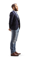 Young professional man in a suit and jeans waiting