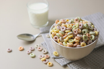 Multicolored corn rings for breakfast on the table