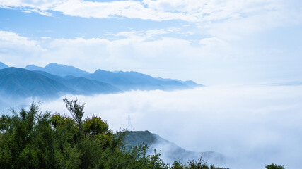 Fototapeta na wymiar clouds collide into mountain