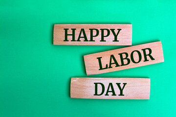 Wooden blocks with words 'Happy Labor Day'.