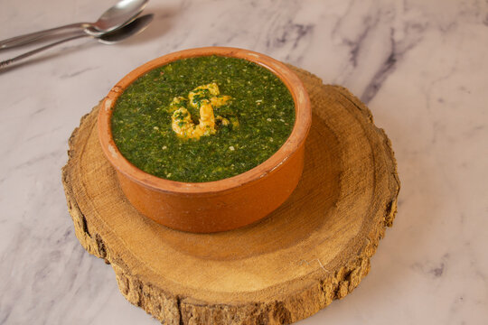 Egyptian Molokhia with shrimp. 
Egyptian typical recipe
Molokhia is an Arabic word and has no translation. 