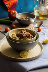 Bowl of meat and soup 
The meat is boiled in water with different spices and presented with its broth. 