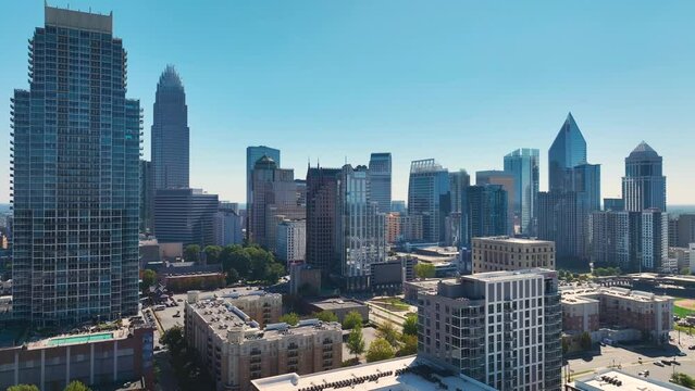 Aerial view of downtown district of Charlotte city in North Carolina, USA. Glass and steel high skyscraper buildings in modern american midtown