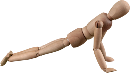 Miniature wooden mannequin in a pushup pose