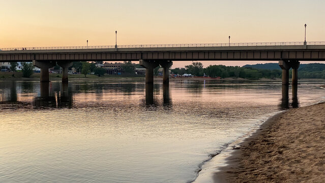 bridge over the river at sunset