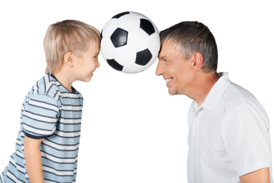 Happy boy and his father playing with football ball isolated