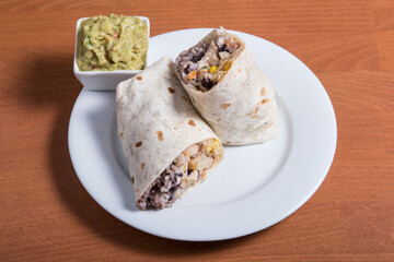 Burrito with beef, beans and tomatoes