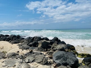 rocks and crashing waves on the beach