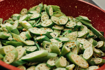 Grilled Chopped Okra in Red Frying Pan
