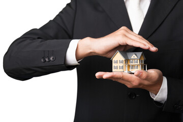 Businessman Holding House Model, Real Estate Concept