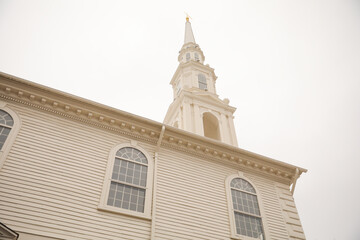 Historic and traditional church architecture showing religious structure in urban downtown city 