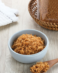 Serundeng, Indonesian spicy coconut flakes, made from grated coconut stir-fried with herbs and spices.
