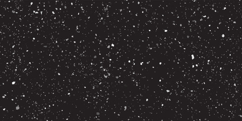 Flying dust particles on a black background