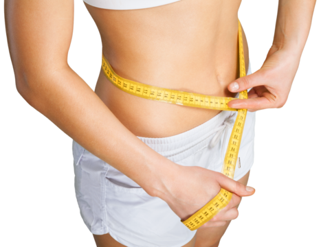 Young woman measuring her waist isolated on white background