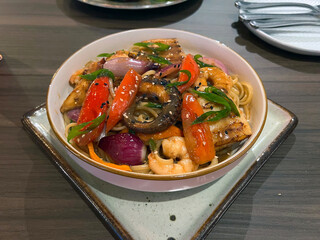 noodles with seafood in a restaurant
