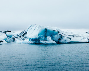 Different shaped glaciers on a lake