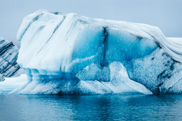 Different shaped glaciers on a lake