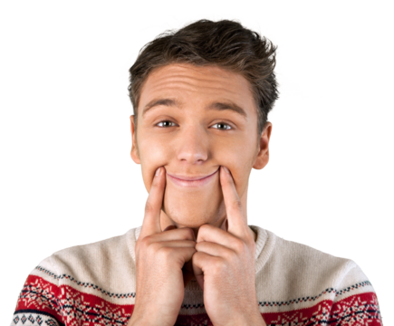 Young man puts his hands to his face and with his fingers pushes his cheeks up to produce a smile, Isolated