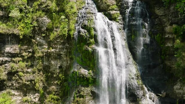 A tropical waterfall in the jungles. Slow motion. Balea Falls in the jungle. Negros, Philippines.