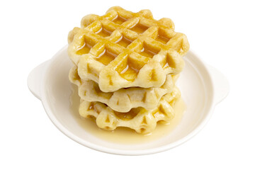 A Pile of Freshly Baked Round Butter Waffles, Belgian breakfast pastry dessert, topping with honey.