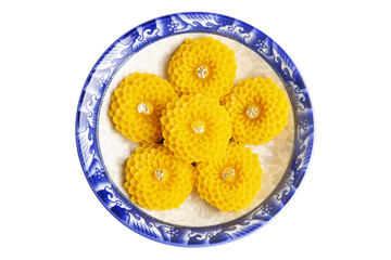 Top View of Wheat Flour Dumplings with Egg Yolks called Thong Ek in Thai, a traditional exotic Thai dessert on vintage dish.