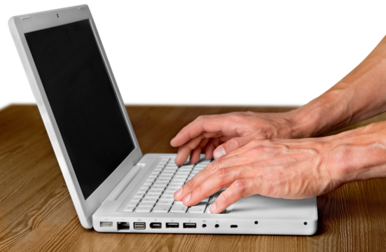 Hands Typing on a Laptop
