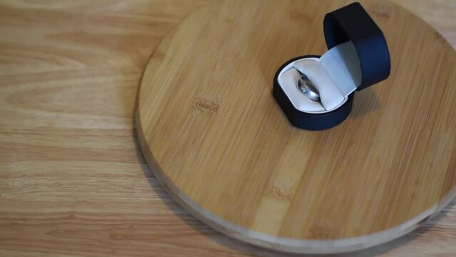 wedding ring in box spinning with copyspace
