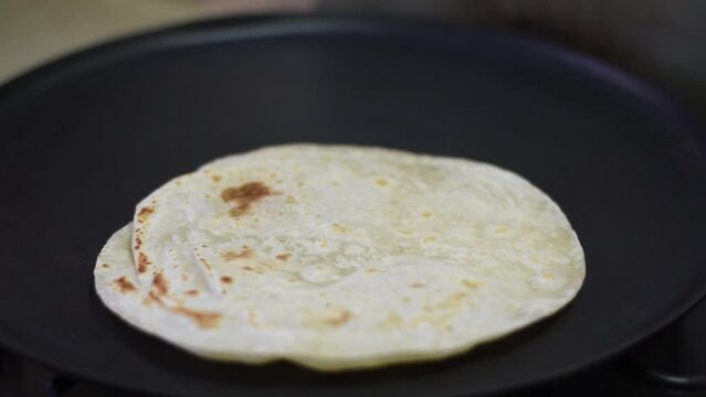 close up tortilla taco cooking in bowl