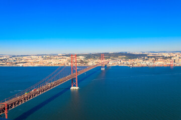The 25th April Bridge (Ponte 25 de Abril) is a suspension bridge road-rail over the Tagus river that connects the city of Lisbon to the city of Almada. View from Almada.